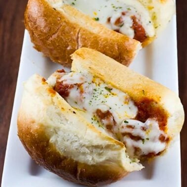 close-up of garlic bread meatball subs