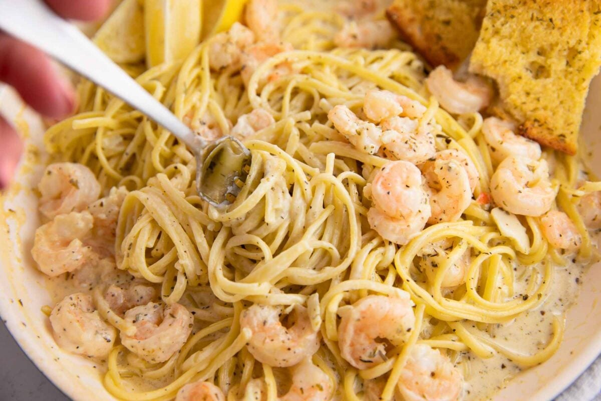 creamy shrimp scampi pasta twirled on a fork.