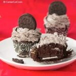 Chocolate Oreo Cupcakes with Cookies & Cream Frosting on a plate