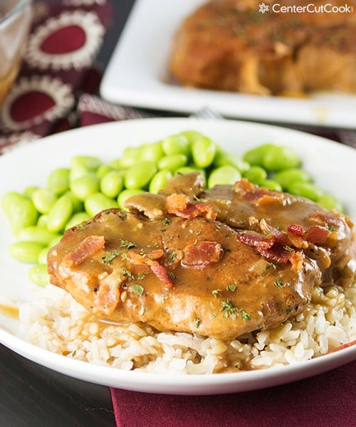 Slow cooker smothered pork chops with rice