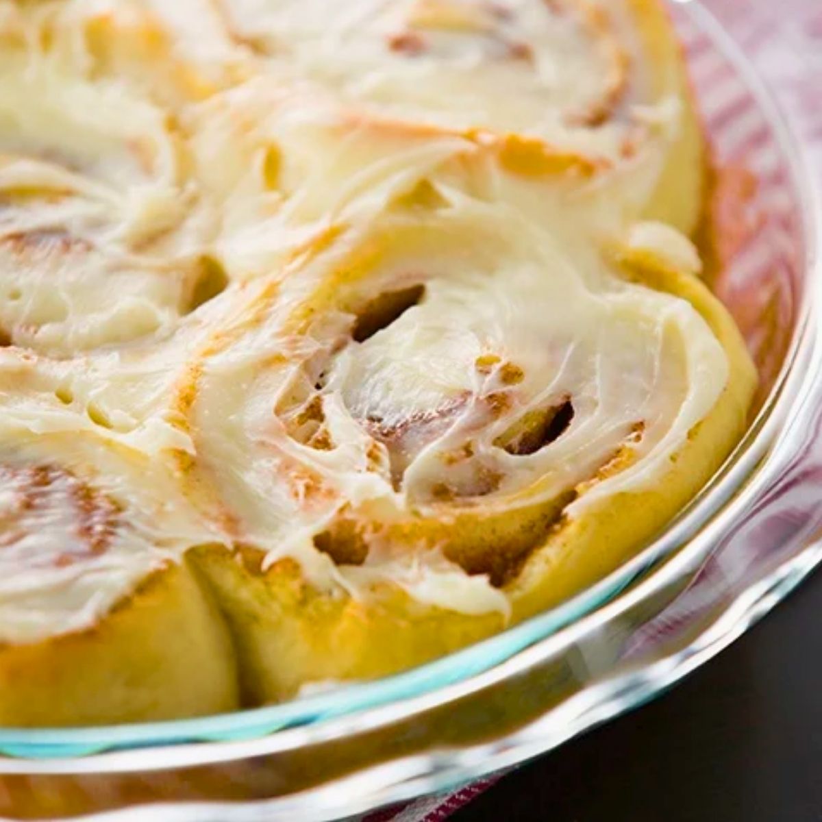homemade cinnamon rolls from scratch with cream cheese frosting.