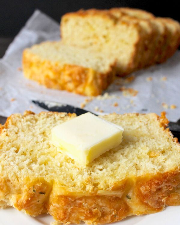 slice of garlic cheese bread with butter
