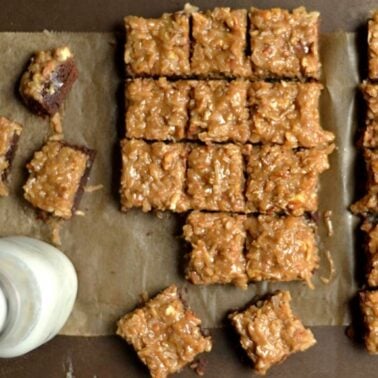 sliced German chocolate brownies topped with coconut-pecan glaze