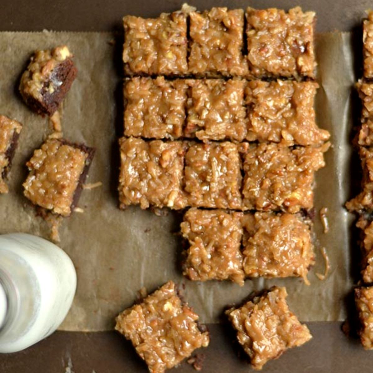 sliced German chocolate brownies topped with coconut-pecan glaze