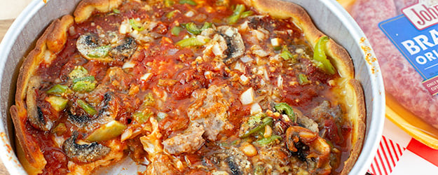 Loaded Deep Dish Pizza with Sausage & Peppers