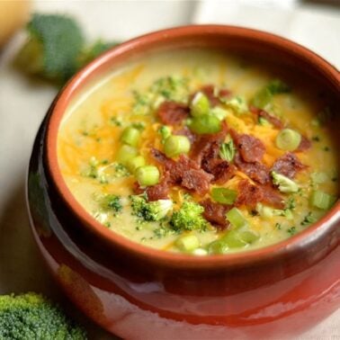 bowl of instant pot cheddar broccoli and potato soup