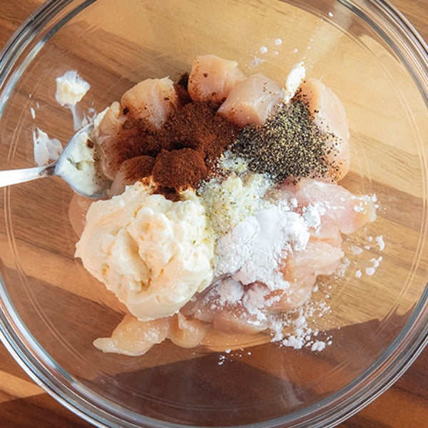 bowl of ingredients for air fryer chicken bites