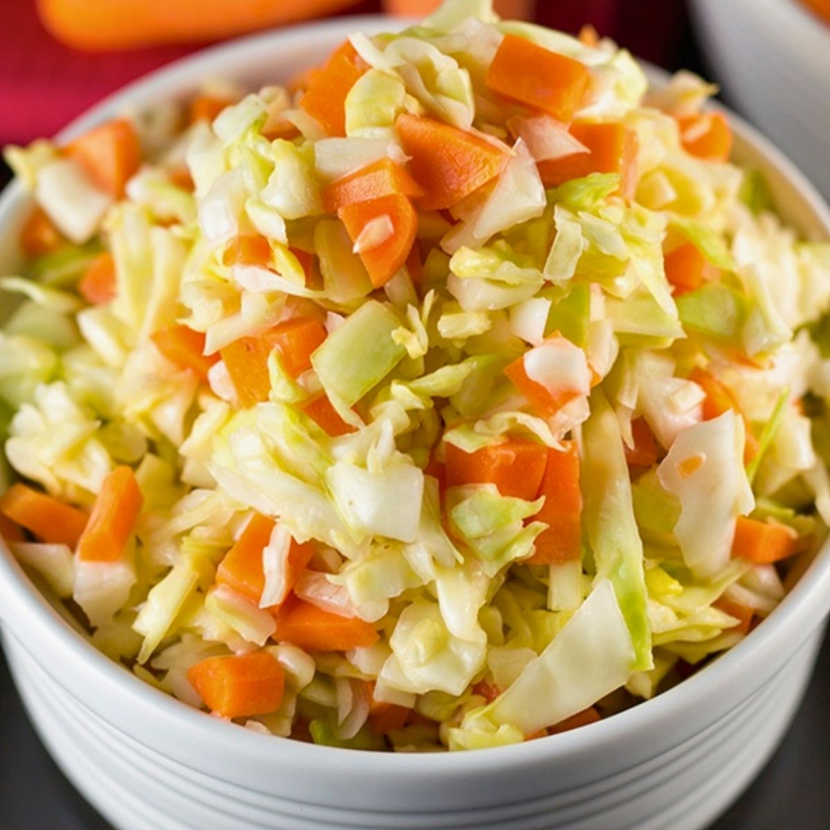 kfc coleslaw copycat recipe with fresh shredded cabbage, carrots and creamy dressing.