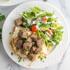 plate of air fryer steak bites with garlic butter