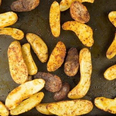 Easy Oven Roasted Fingerling Potatoes on a baking sheet