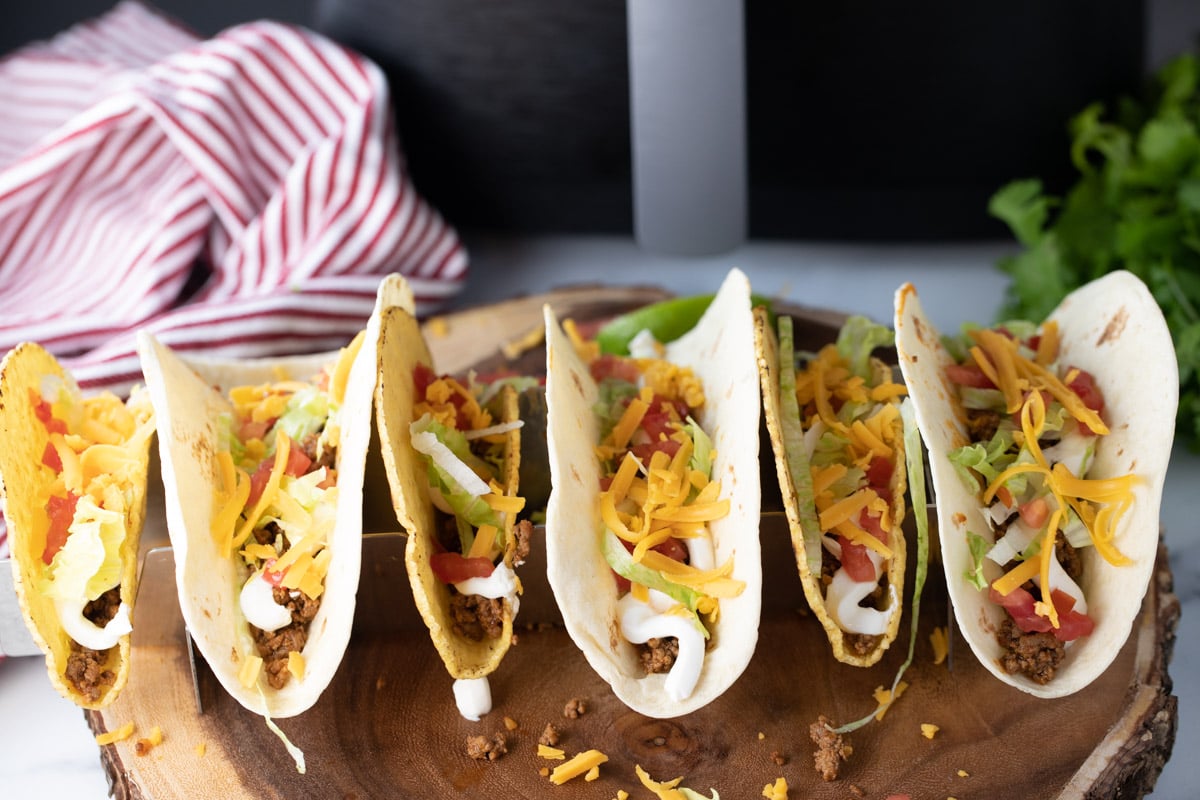 Taco shells heated in air fryer with toppings