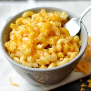 bowl of instant pot easy mac and cheese with fork