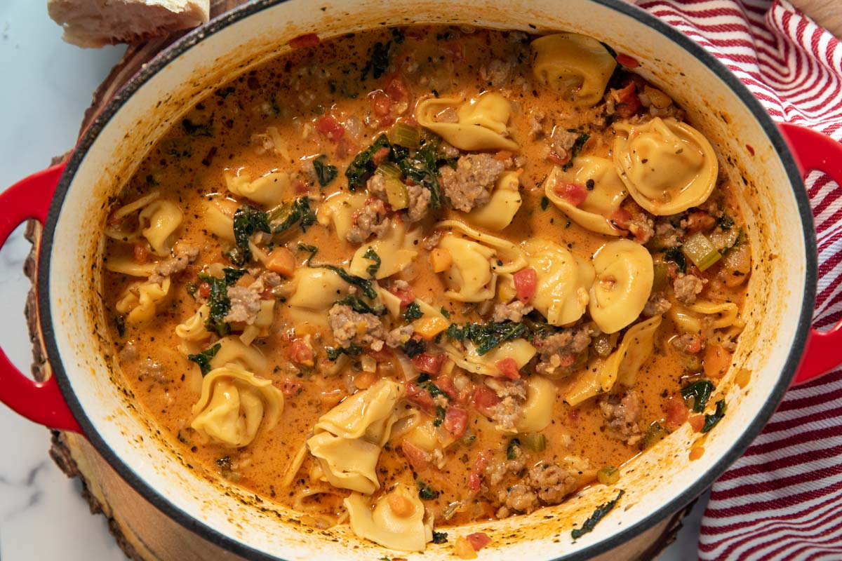 overhead of a pot of spicy tortellini soup