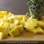 cut pineapple on a cutting board