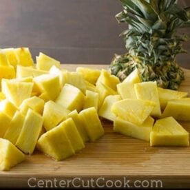 cut pineapple on a cutting board