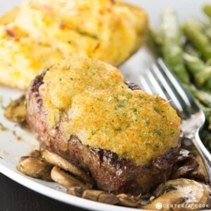 parmesan crusted steak on a plate