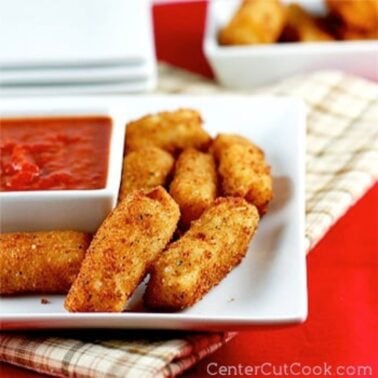 Mini Mozzarella Sticks on a plate with dipping sauce