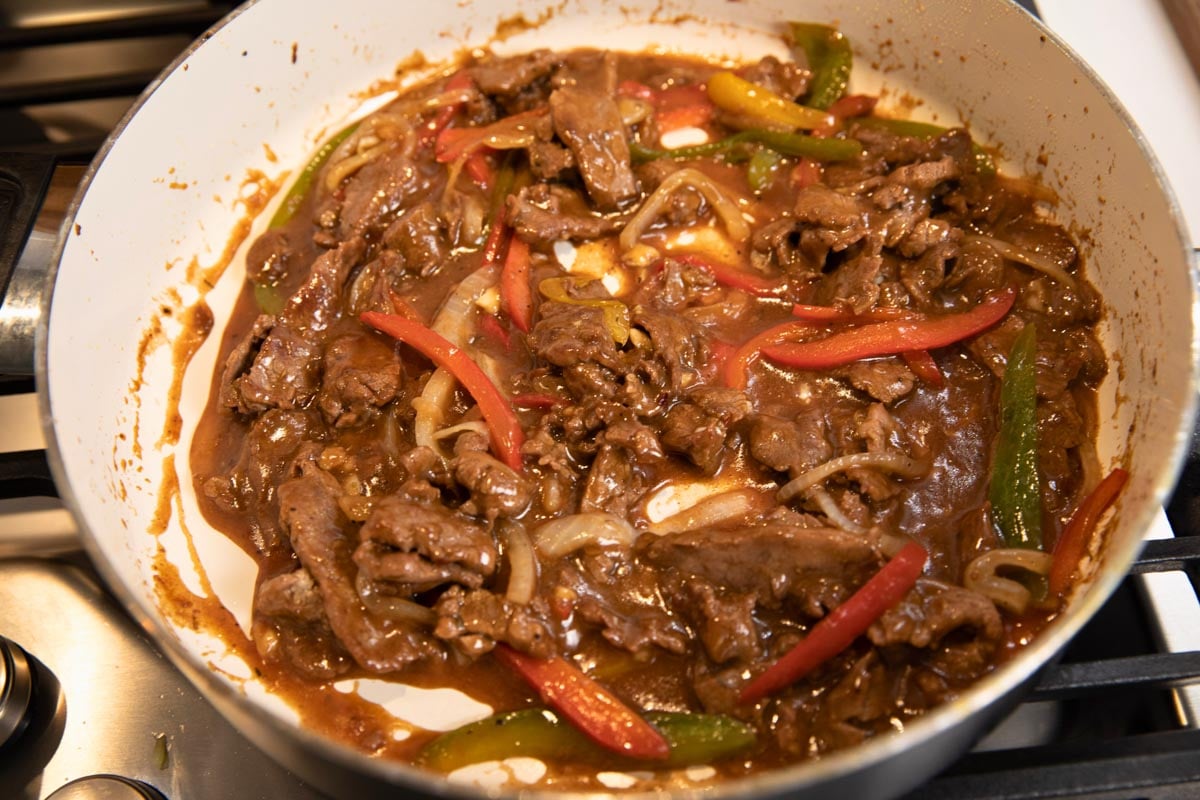 skillet with pepper steak and onions