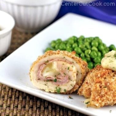 Chicken Cordon Bleu Rollups on a plate with peas