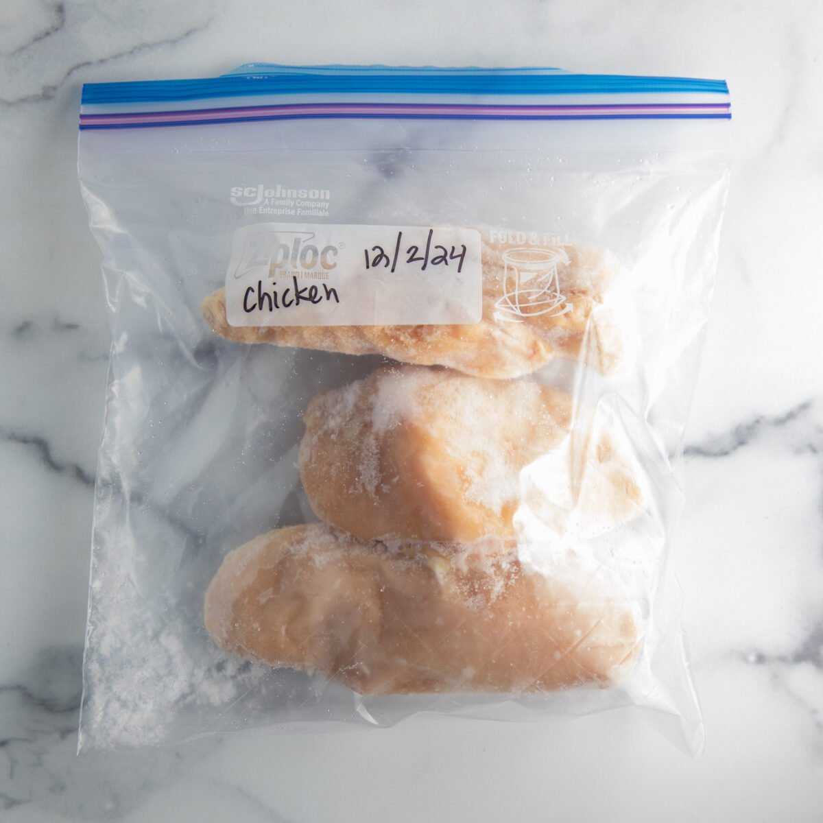 bag of frozen chicken breasts before placing in an Instant Pot to cook