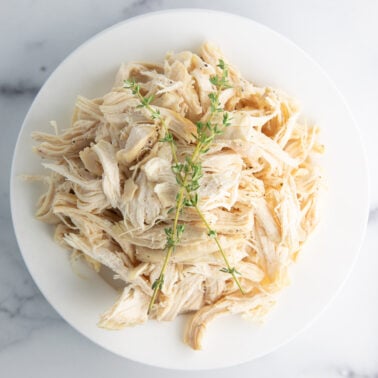 frozen chicken breasts cooked in the Instant Pot ready to be served.