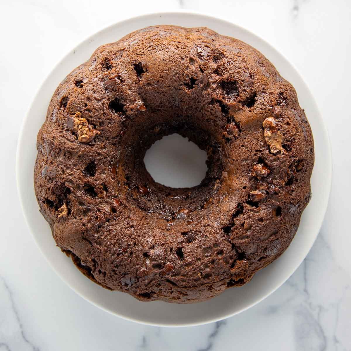 chocolate Bundt Cake cooling on a plate