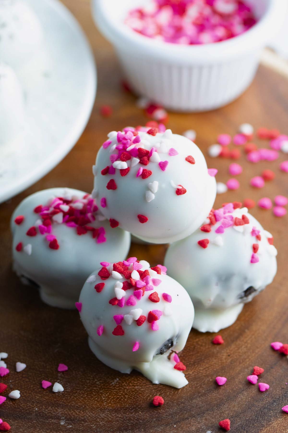 finished Oreo balls for Valentine's Day topped with Valentine's Day sprinkles