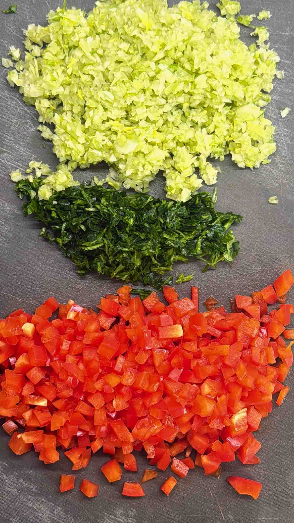 chopped vegetables for macaroni salad: celery, bell pepper, parsley