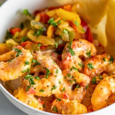 close up of air fryer shrimp coated with a sweet chili sauce
